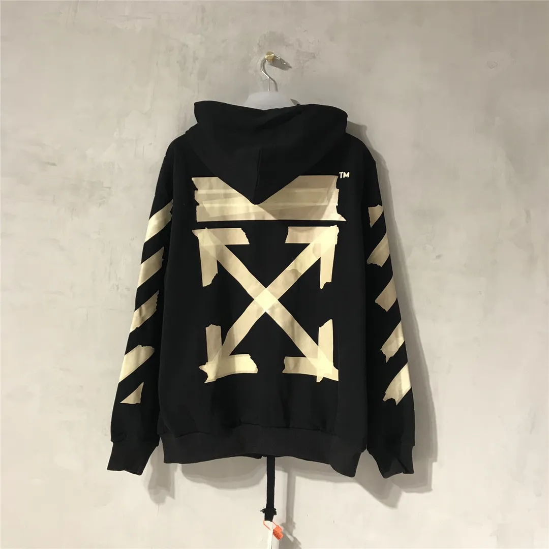 Top tested version OFF WHITE OW hot stamping tape printing male and female couples pure cotton loose same style zipper jacket hooded sweatshirt The printing is done on a Japanese-owned Mimaki printing machine, with no edges or burrs. Inkjet heat transfer is hot-pressed and cold-teared, and the high temperature is 180 degrees. The front piece needs to be pressed twice (the second time requires 180kg of air pressure). The transparent fabric is anti-scratch and ironing, and the printing is fog-free. The semi-transparent tape in the front circle can reveal the part of the printing underneath. The golden printing color of the tape is not The flat color and tape printing overlap have different color depths. The wash label is also customized according to the original font. The accessories still use the full line of correct accessories. The rectangular woven collar label design is cancelled. The previous three-dimensional silicone feel font is changed to a fully woven collar label. Fluorescent fonts can be seen on the collar label. The five-link silicone hangtag, three-link washable label and zebra crossing packaging line are still the same. 480g pure cotton terry fabric, a major launch with full drape. A full set of customized accessories, one-to-one mold opening, professional ow. Size: XS-L Size chart